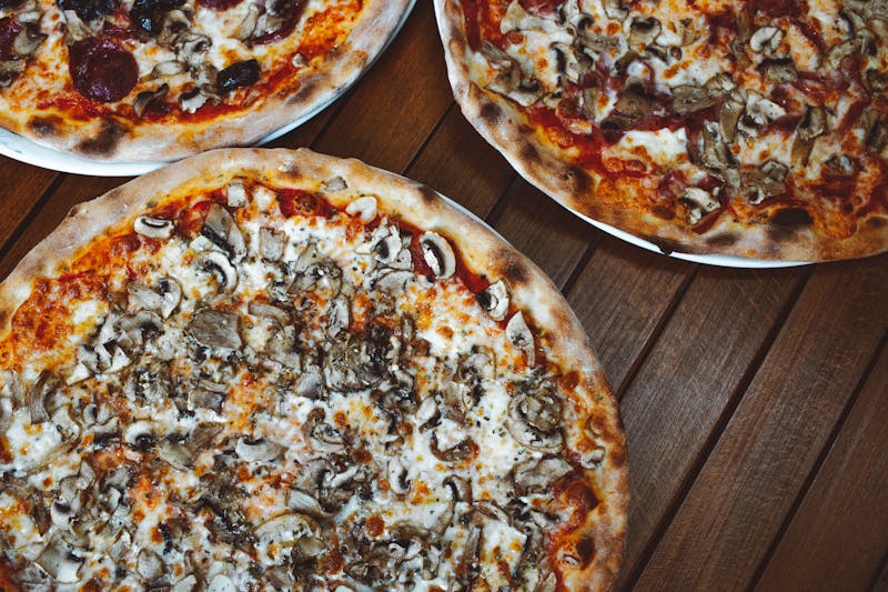 Grand Ave pizza loaded with premium local ingredients
